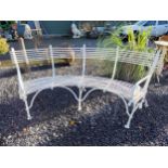 Good quality hand forged wrought iron Arras style curved bench. {86 cm H x 196 cm W x 70 cm D}.