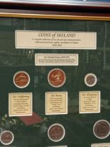 Framed montage of Coins of Ireland 1928-2001 {H 56cm x W 46cm}.