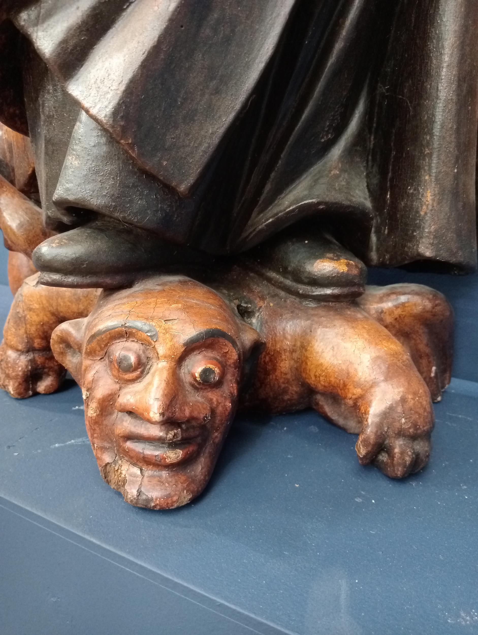 Solid wooden 18th C. religious figure of St Anthony conquering the demons shown under his feet {H - Image 5 of 6