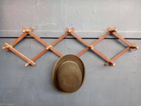 Late 19th C. wooden concertina coat and hat rack. {H 30cm x W 100cm x D 10cm }.