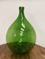 Green glass demi john. {H 66cm x Dia 42cm}.