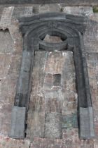 Early 19th C. Kilkenny stone door frame with arched top enclosing an oval window {H 360cm x W