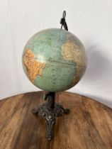 Victorian World globe on cast iron base {H 62cm }.