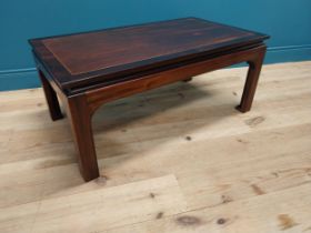 Good quality mahogany and rosewood cross banded coffee table raised on square legs in the Oriental