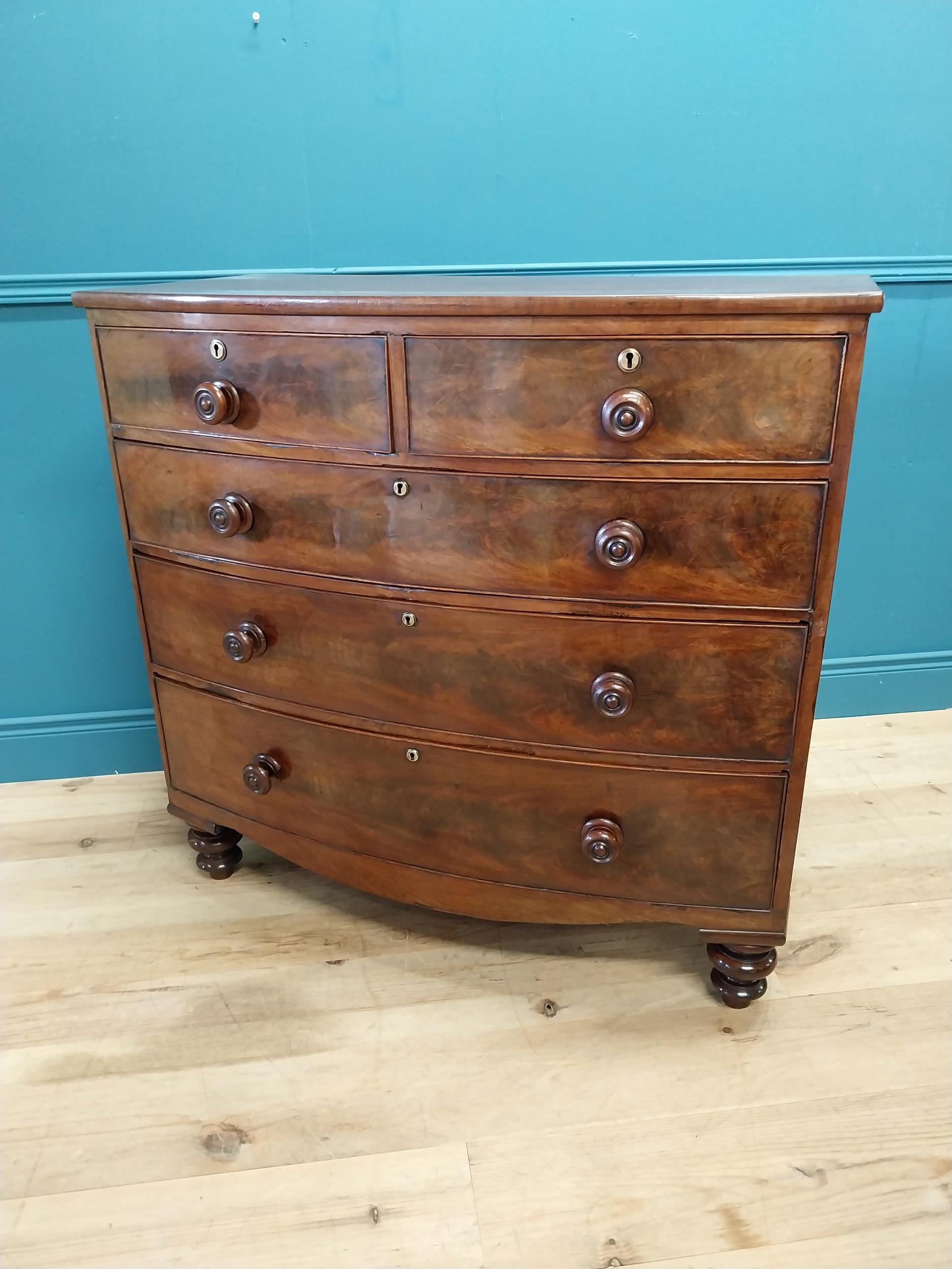 19th C. flamed mahogany bow fronted chest of drawers with two short drawers over three graduated - Image 5 of 7