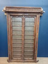Carved wooden Moroccan door with metal panels and studding {H 180cm x W 120cm x D 40cm }.