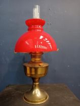 Early 20th C. Aladdin lamp with red glass mushroom shade. {H 55cm x Dia 24cm}.