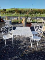 Good quality cast aluminium bamboo style garden table with four chairs. Table {70 cm H x 129 cm W