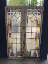 Pair of leaded stain glass windows with brass locks in the Arts and Crafts manner. {Each H 98cm x