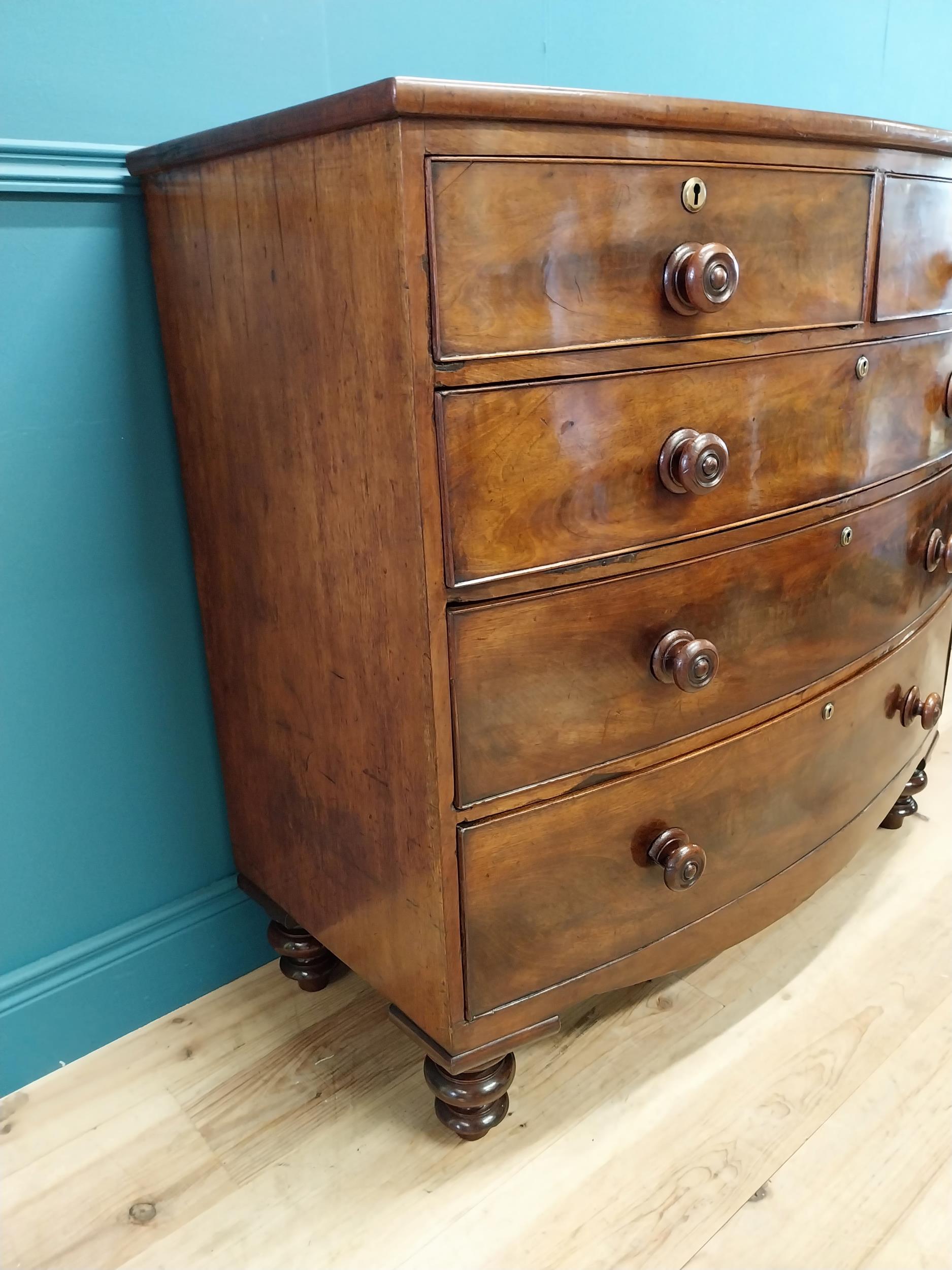 19th C. flamed mahogany bow fronted chest of drawers with two short drawers over three graduated - Image 3 of 7