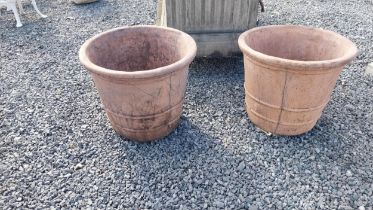 Pair of moulded terracotta planters {45 cm H x 54 cm Dia}.(not available to view in person).