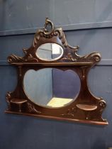 Mahogany carved bevelled glass wall mirror {H 80cm x W 120cm x D 15cm }.