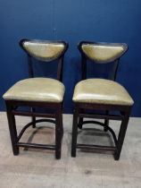 Pair of high stools with green leather upholstery {H 91cm x W 43cm x D 42cm }.
