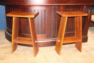 Pair of teak dished seat high stools {H 82cm x W 50cm x D 30cm}.