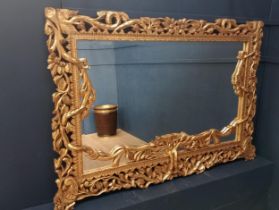 Wooden gilt rectangle mirror surmounted with branches and leaves {H 140cm x W 200cm x D 5cm }.