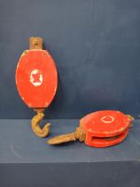 Pair of red ships metal pulleys {H 48cm x W 18cm x D 9cm }.