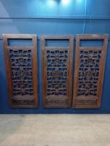 Three oriental lattice and carved wood dividers. {Each panel H 145cm x W 60cm x D 4cm }.