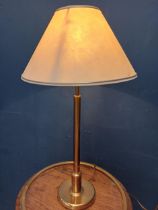Brass table lamp with cloth shade. {H 70cm x Dia 38cm }.