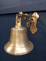 20th C brass bell and bracket {H 19cm x W 13cm x D 20cm }.