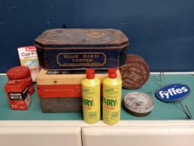 Ten advertising tins and two Fairy liquid bottles