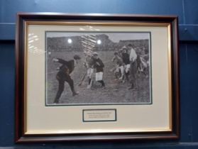 Framed black and white print of Michael Collins playing Hurling. {H 36cm x W 46cm}.