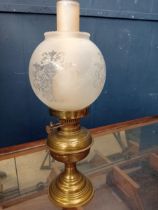 Brass oil lamp with frosted shade {H 50cm x dia 18cm}.