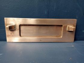 Edwardian brass door letter box. {H 7cm x W 20cm }.