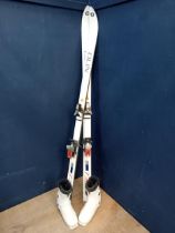 Pair of retro skis and boots size 6