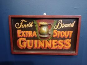 Finest brewed extra stout Guinness wooden advertising board {H 31cm x W 53cm x D 4cm}.