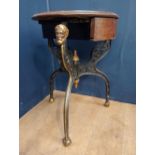 19th C. cast mahogany table top with single drawer on cast iron base surmounted by heads on three