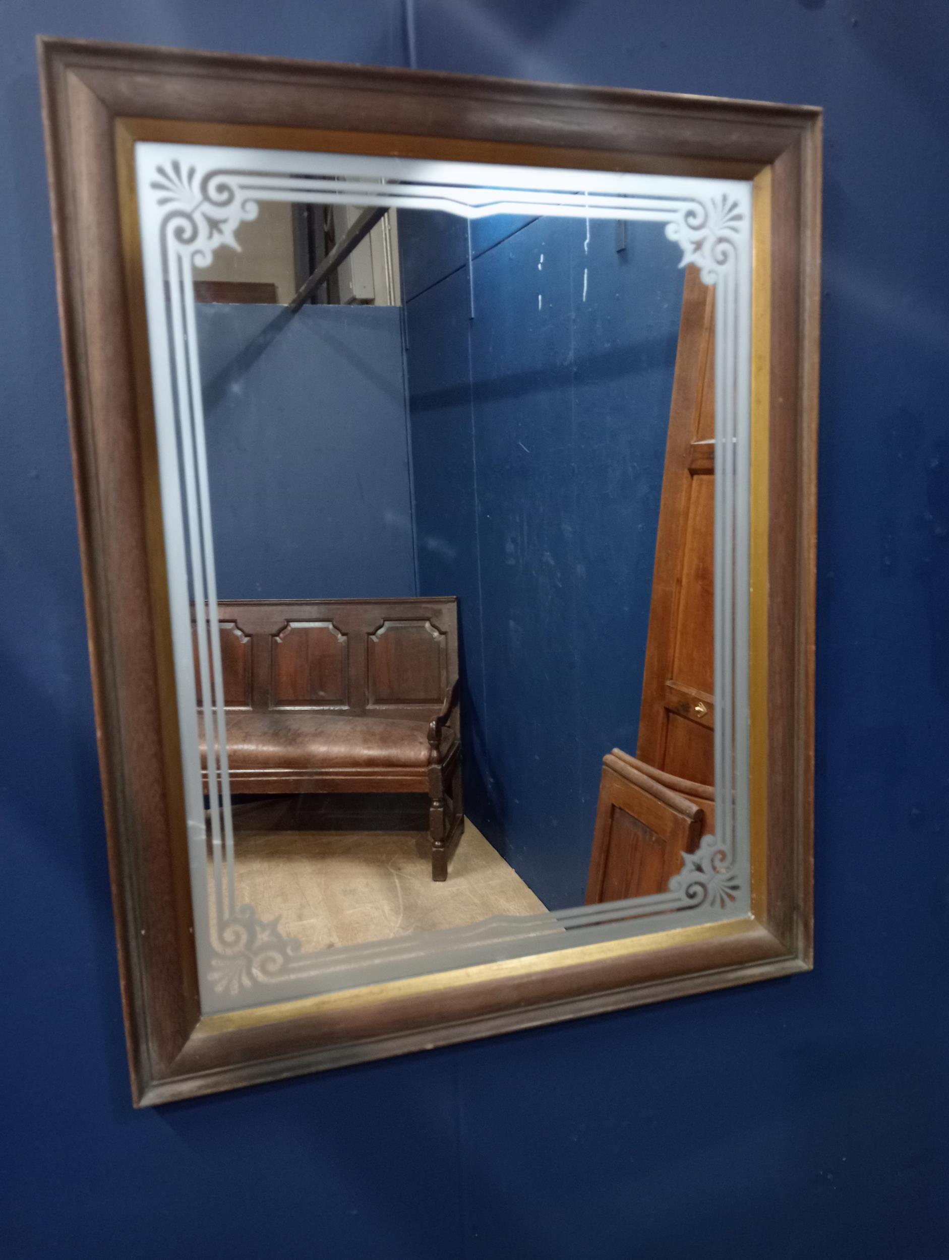 Etched wall mirror in oak frame {H 83cm x W 65cm }.