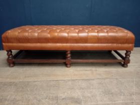 Victorian oak and upholstered deep button stool on turned legs. {50cm H x 178cm W x 73cm D}