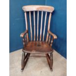 Oak and elm wood slat backed rocking chair {H 104cm x W 54cm x D 56cm}.