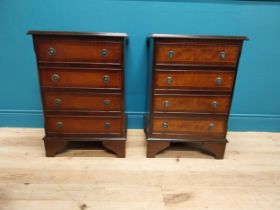 Pair of good quality mahogany and satinwood inlaid bedside cabinets with four drawers raised on