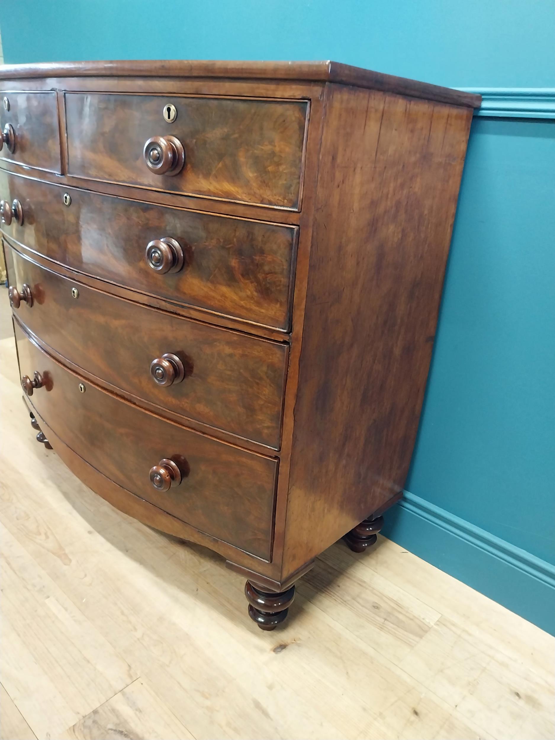19th C. flamed mahogany bow fronted chest of drawers with two short drawers over three graduated - Image 4 of 7