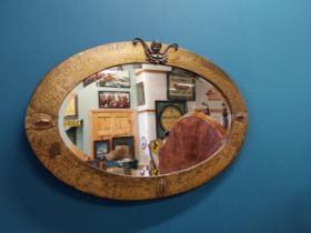 Art Deco brass framed wall mirror {54 cm H x 80 cm W}.