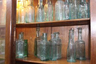 19th C. Collection of twenty glass sauce bottles {Tallest H 19cm down to H 14cm}.