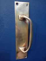 Brass door handle {H 22cm x W 5cm }.