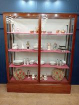 Mahogany glazed shop cabinet with three graduated shelves. {H 183cm x W 154cm x D 40cm }.