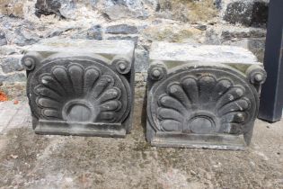 Pair of 19th C. stone heads with scroll and shell design {H 124cm x W 36cm x D 110cm }.