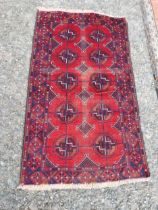 Good quality decorative Persian rug {130cm W x 80cm L} (not available to view in person).