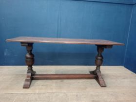 Oak refectory table vintage raised on turned supports with central stretcher. {H 73cm x W 167cm x
