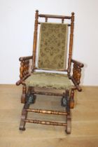 Late 19th. C. American rocking chair with upholstered seat. {H 103cm x W 54cm x D 52cm }.