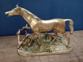 Brass model of horse at gate {H 16cm x W 22cm x D 10cm}.
