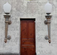 Pair of bronze wall sconces with white plastic shades in the form of torches. {H 160cm x W 40cm x