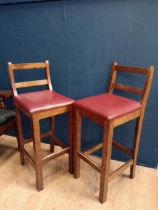 Pair of high backed bar stools with upholstered seats {H 101cm x W 40cm x D 44cm}.