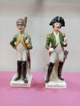 Pair of Capodimonte soldier figures. {H 23cm x W 6cm x D 6cm }.