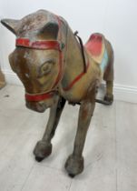 Metal toy horse on wheels Mastercraft Scotland {H 66cm x L 76cm x W 34cm}.