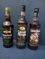 Three vintage bottles Captain Morgan Rum - one Original , one black label and one black label {70CL,