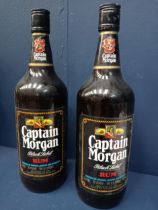 Two vintage Captain Morgan black label rum {1 Litre in size}.